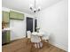 Eat-in kitchen featuring a breakfast nook with a modern round table and seating at 1114 Margaret Dr, Ladson, SC 29456