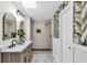 Stylish bathroom featuring double vanity, modern fixtures, and tiled walk-in shower at 123 Sharon Dr, Walterboro, SC 29488