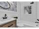 Charming bathroom features designer wallpaper and a shower-tub combo at 123 Sharon Dr, Walterboro, SC 29488