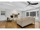 Inviting living room with brick fireplace, hardwood floors, bay window, and comfortable seating at 123 Sharon Dr, Walterboro, SC 29488