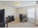Carpeted room featuring a desk, chair, and modern lighting fixtures at 1376 Wild Goose Trl, Summerville, SC 29483