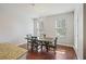 Bright dining area with natural light, wooden table set, and open space at 1376 Wild Goose Trl, Summerville, SC 29483