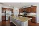 Modern kitchen featuring granite countertops, stainless steel appliances, and an island with a sink at 1376 Wild Goose Trl, Summerville, SC 29483