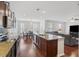 Open kitchen with stainless appliances, granite countertops, and seamless view to dining and living area at 1376 Wild Goose Trl, Summerville, SC 29483