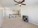 Loft area with carpet, a ceiling fan, and railing at 1376 Wild Goose Trl, Summerville, SC 29483