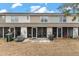 Townhome rear exterior with patio and grass at 138 Taylor Cir, Goose Creek, SC 29445