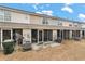 Townhome rear exterior with patio and grass at 138 Taylor Cir, Goose Creek, SC 29445