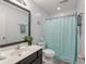 Bathroom features a vanity sink, a shower with a curtain, and neutral decor at 138 Taylor Cir, Goose Creek, SC 29445