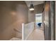 Hallway with barn door leading to carpeted bedroom with a large window at 138 Taylor Cir, Goose Creek, SC 29445