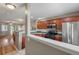 Modern kitchen featuring stainless steel appliances, dark wood cabinets, and open layout to living area at 138 Taylor Cir, Goose Creek, SC 29445