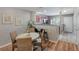Bright living room showcasing an eat-in kitchen with stainless steel appliances and barstool seating at 138 Taylor Cir, Goose Creek, SC 29445