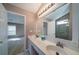 Bathroom with double sink vanity, large mirror, and shower at 1529 Wellesley Cir, Mount Pleasant, SC 29466