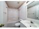 This bathroom features a shower-tub combo, tile flooring, and a vanity with a framed mirror at 1529 Wellesley Cir, Mount Pleasant, SC 29466