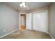 Neutral bedroom featuring plush carpeting, a ceiling fan, and a double-door closet for optimal storage at 1529 Wellesley Cir, Mount Pleasant, SC 29466
