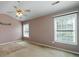 Vaulted bedroom with a ceiling fan and natural light from windows at 1529 Wellesley Cir, Mount Pleasant, SC 29466