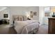 Bedroom with a comfortable bed and an adjacent seating area, offering a relaxing and inviting retreat at 1656 Lauda Dr, Mount Pleasant, SC 29464