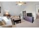 Cozy living room with couches, a TV, and a table, creating a comfortable space for relaxation and entertainment at 1656 Lauda Dr, Mount Pleasant, SC 29464