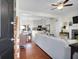 Inviting living space with hardwood floors and staircase open to dining room and kitchen at 1656 Lauda Dr, Mount Pleasant, SC 29464