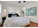 Comfortable bedroom featuring hardwood floors, decorative lamps, and a king bed at 1656 Lauda Dr, Mount Pleasant, SC 29464