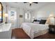 Calming main bedroom with hardwood floors, natural light, and neutral decor at 1656 Lauda Dr, Mount Pleasant, SC 29464