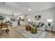 Bright, open-concept living space connecting kitchen, dining, and seating areas at 1744 Pinckney Park Dr, Charleston, SC 29407