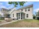 Spacious backyard with a patio and a view of the screened porch at 1878 Carolina Bay Dr, Charleston, SC 29414