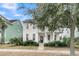 Charming two-story home featuring a welcoming front porch and lush, green landscaping at 1878 Carolina Bay Dr, Charleston, SC 29414