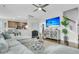 Comfortable living room showcasing the kitchen, bar seating, and natural light from nearby windows at 1878 Carolina Bay Dr, Charleston, SC 29414