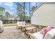 This backyard patio offers seating, a brick surface, and plenty of privacy to relax or entertain guests at 1878 Carolina Bay Dr, Charleston, SC 29414