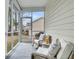 Relaxing screened porch with comfortable seating, lemons and nice views at 1878 Carolina Bay Dr, Charleston, SC 29414