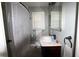 Bathroom featuring a shower with a decorative curtain, vanity, and a mirrored medicine cabinet at 1902 Morgan Ave, North Charleston, SC 29406