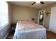 Well-lit bedroom with hardwood floors and a view to another room at 1902 Morgan Ave, North Charleston, SC 29406