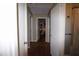Hallway with wood floors and access to multiple rooms at 1902 Morgan Ave, North Charleston, SC 29406