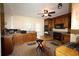 Kitchen with wooden cabinets, tile floor and view of backyard at 1902 Morgan Ave, North Charleston, SC 29406