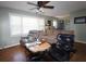 Spacious living room featuring a ceiling fan, comfortable seating, and wood floors at 1902 Morgan Ave, North Charleston, SC 29406