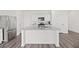 Modern kitchen with stainless steel appliances and a granite countertop island at 192 Lyra Ln, Summerville, SC 29486