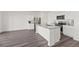 Modern kitchen with granite countertops, stainless steel appliances, and an open layout at 192 Lyra Ln, Summerville, SC 29486