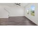 Bright living area with modern flooring, staircase, and ample natural light at 192 Lyra Ln, Summerville, SC 29486
