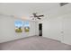 Spacious main bedroom with carpet, ceiling fan, and natural light at 192 Lyra Ln, Summerville, SC 29486