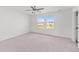 Spacious main bedroom with carpet, a ceiling fan, and natural light at 192 Lyra Ln, Summerville, SC 29486