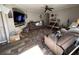 View of the living room with ceiling fan, fireplace, and hardwood floors at 197 Melrose Pl, Moncks Corner, SC 29461