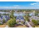 Stunning aerial view of the property showcasing its prime waterfront location and the surrounding neighborhood at 2040 Ashburton Way, Mount Pleasant, SC 29466
