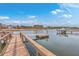Picturesque dock with boat lift offering direct water access for boating, fishing, and enjoying waterfront activities at 2040 Ashburton Way, Mount Pleasant, SC 29466