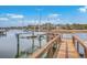 Private dock with a boat lift, providing convenient access to the water for boating and enjoying waterfront living at 2040 Ashburton Way, Mount Pleasant, SC 29466