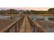 Picturesque waterfront dock extending over tranquil waters, offering a serene escape for relaxation and recreation at 2040 Ashburton Way, Mount Pleasant, SC 29466