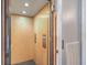 Private elevator with wood paneling and simple controls inside the home at 2040 Ashburton Way, Mount Pleasant, SC 29466