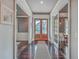 Inviting foyer with hardwood floors, double glass doors, and stylish decor, offering a warm greeting at 2040 Ashburton Way, Mount Pleasant, SC 29466