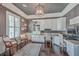 A beautiful home office with a built-in desk, cabinets, and shelving for an organized workspace at 2040 Ashburton Way, Mount Pleasant, SC 29466