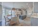 Open concept kitchen with large island, stainless appliances and an eat-in kitchen area at 2040 Ashburton Way, Mount Pleasant, SC 29466
