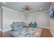Cozy living room with a comfortable sofa, a unique coffee table, and a mounted television at 2040 Ashburton Way, Mount Pleasant, SC 29466